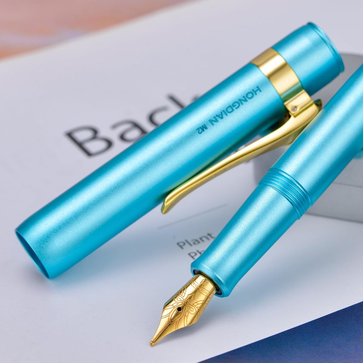 HONG DIAN M2 Black Forest Mini Fountain Pen, Medium Soft Nib & Sleek Shape Aluminium Short Pocket Travel Pen (Lake Blue)