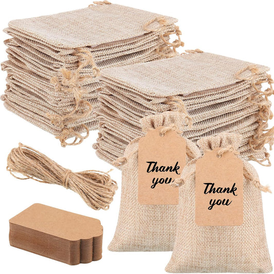 Woanger 100 Pcs Burlap Gift Bags with 100 Pcs Kraft Paper Gift Tags Drawstring Favor Bulk Burlap Sack Bags for DIY Wedding Party Craft(3 x 4 Inch,Light Brown)